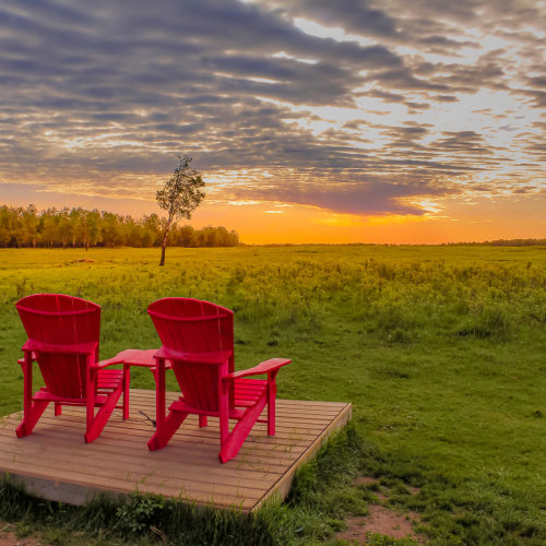 Sunrise Over Classic Adirondack Chairs